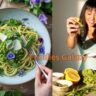 Mafaldine pasta tossed in vibrant green Meyer lemon and pea shoot pesto, garnished with Parmesan and edible flowers on a white ceramic plate